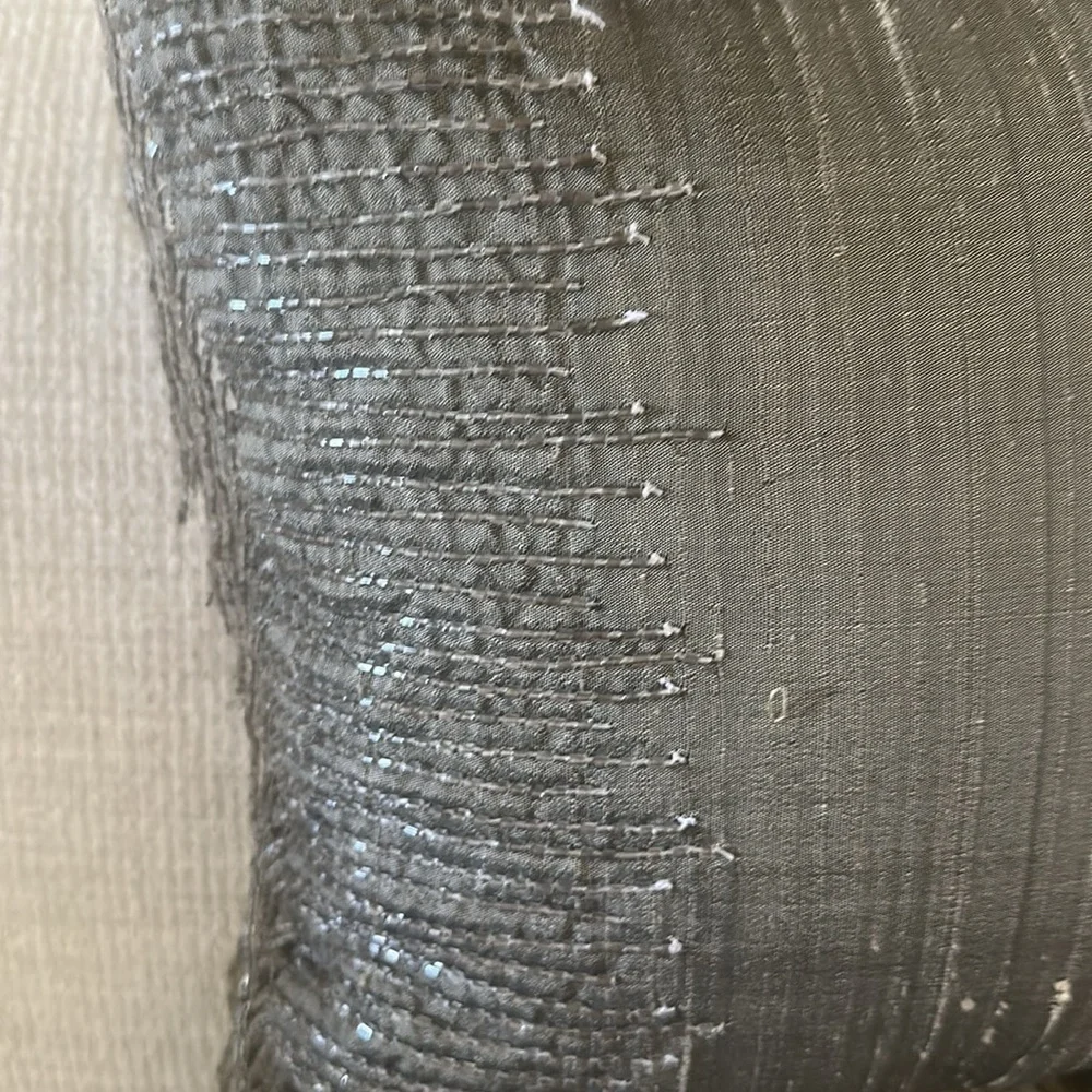 Two green 20 inch long silk pillows